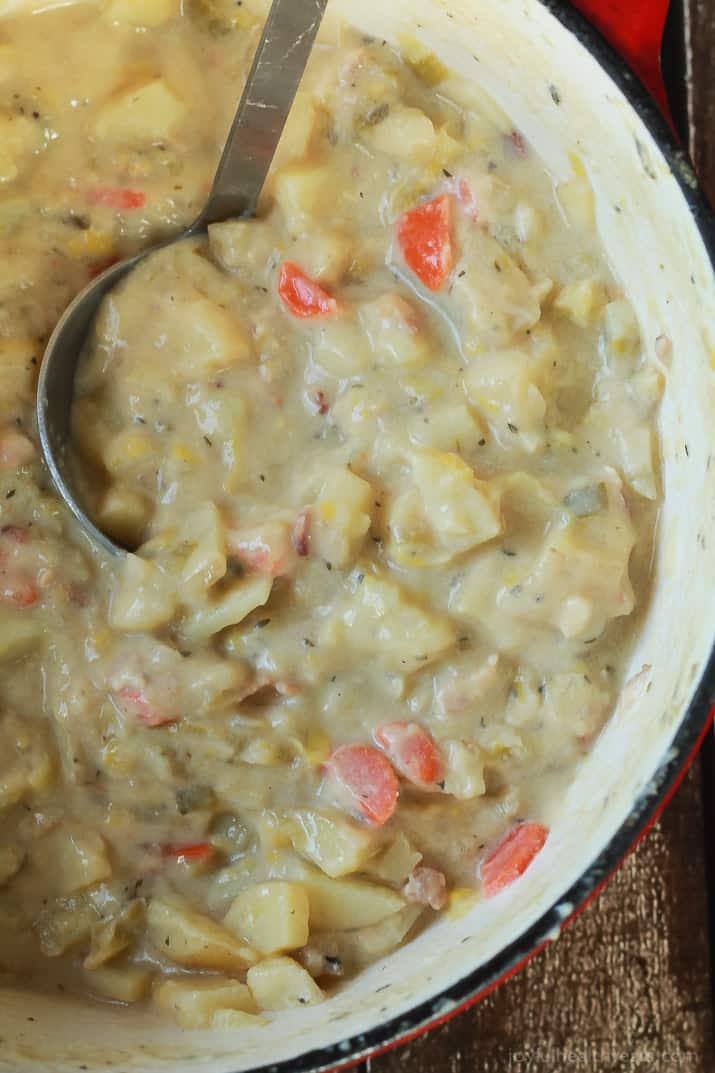 Top view of Creamy Potato Leek Soup in a pot with a ladle