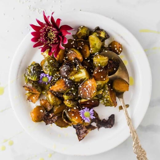 photo of honey soy roasted brussels sprouts on a plate