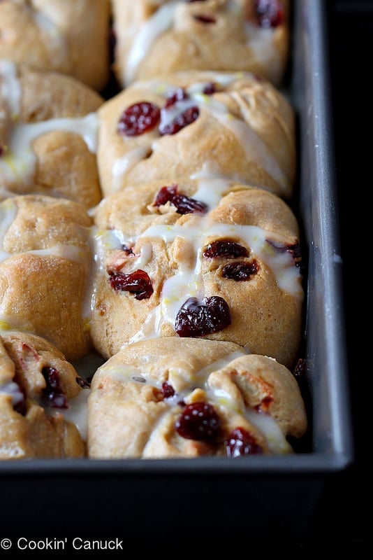 Whole Wheat Hot Cross Buns with Cranberry and Lemon on a Baking Sheet