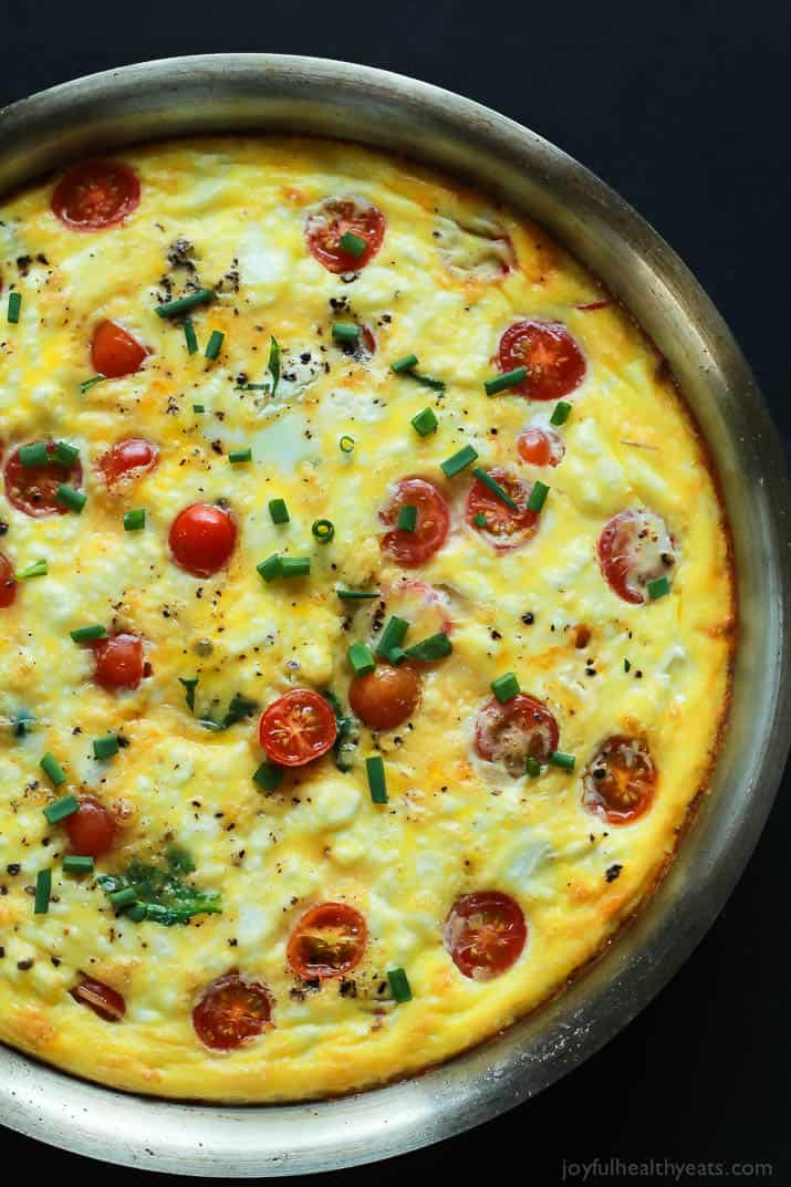 Top view of Cheesy Bacon Spinach Frittata in a pan