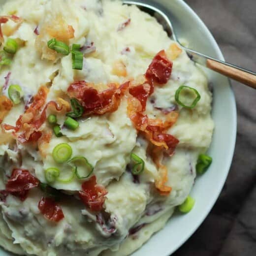 A Close-Up Shot of Creamy Goat Cheese Horseradish Mashed Potatoes in a Bowl