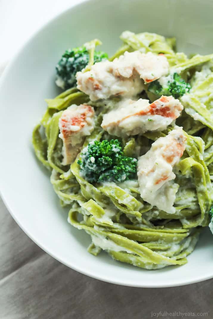 Skinny Chicken Alfredo Pasta made with Cauliflower Alfredo Sauce, Fresh Spinach Pasta, and Broccoli - all on the table in 30 minutes! YES please! | joyfulhealthyeats.com #recipes