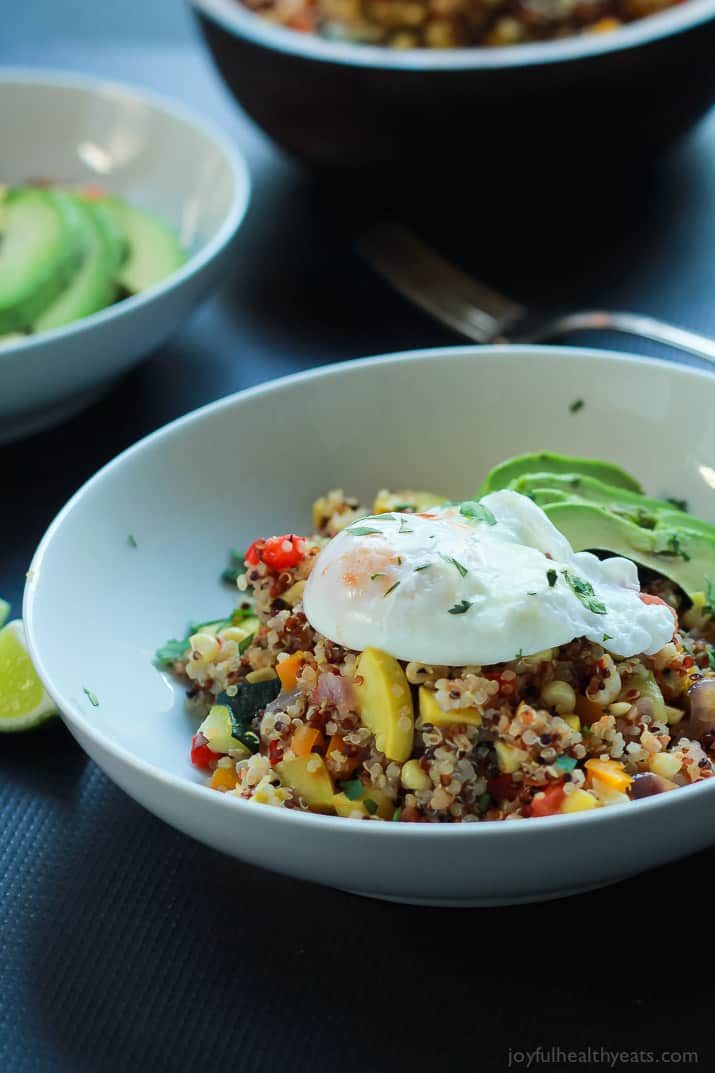 A heart healthy Southwestern Roasted Vegetable Quinoa Salad packed with protein and loads of flavor then topped with a poached egg and fresh avocado! Holy Yum! | joyfulhealthyeats.com #recipes