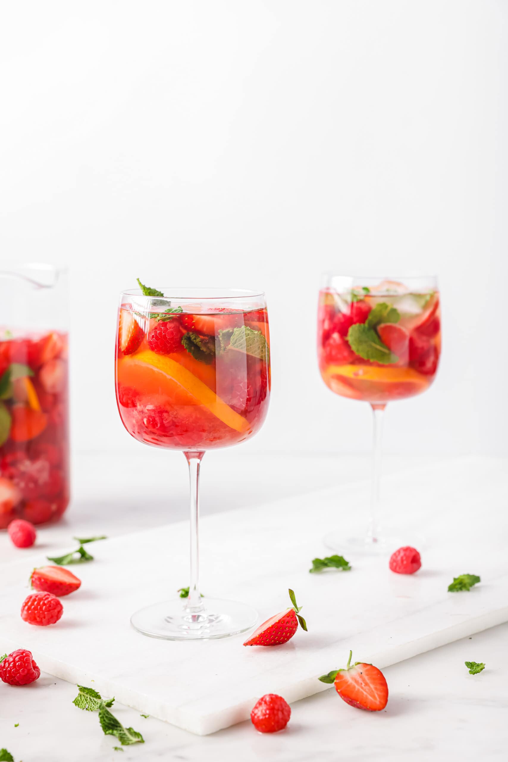 Two glasses of sangria with ice and mint. 