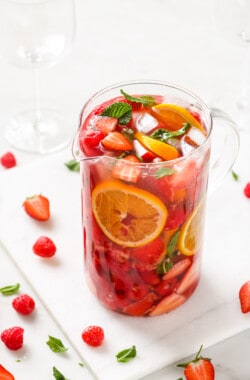 Pitcher of strawberry sangria with ice.