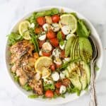 overhead photo of avocado caprese chicken salad with balsamic vinaigrette