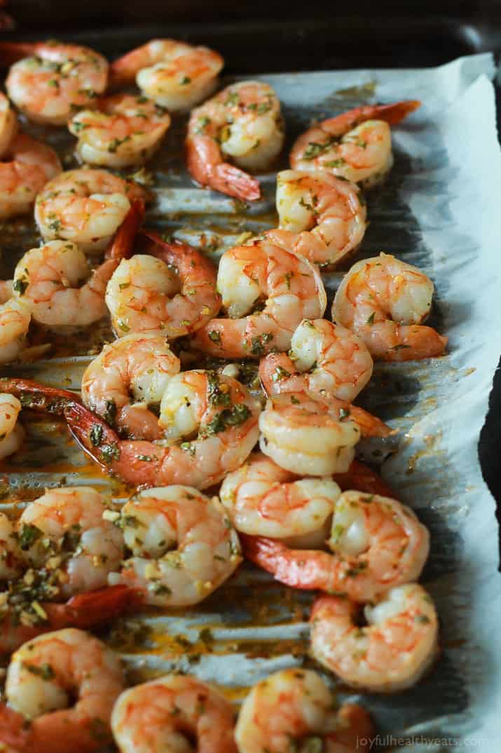 Cilantro Lime Roasted Shrimp on a parchment-lined baking sheet