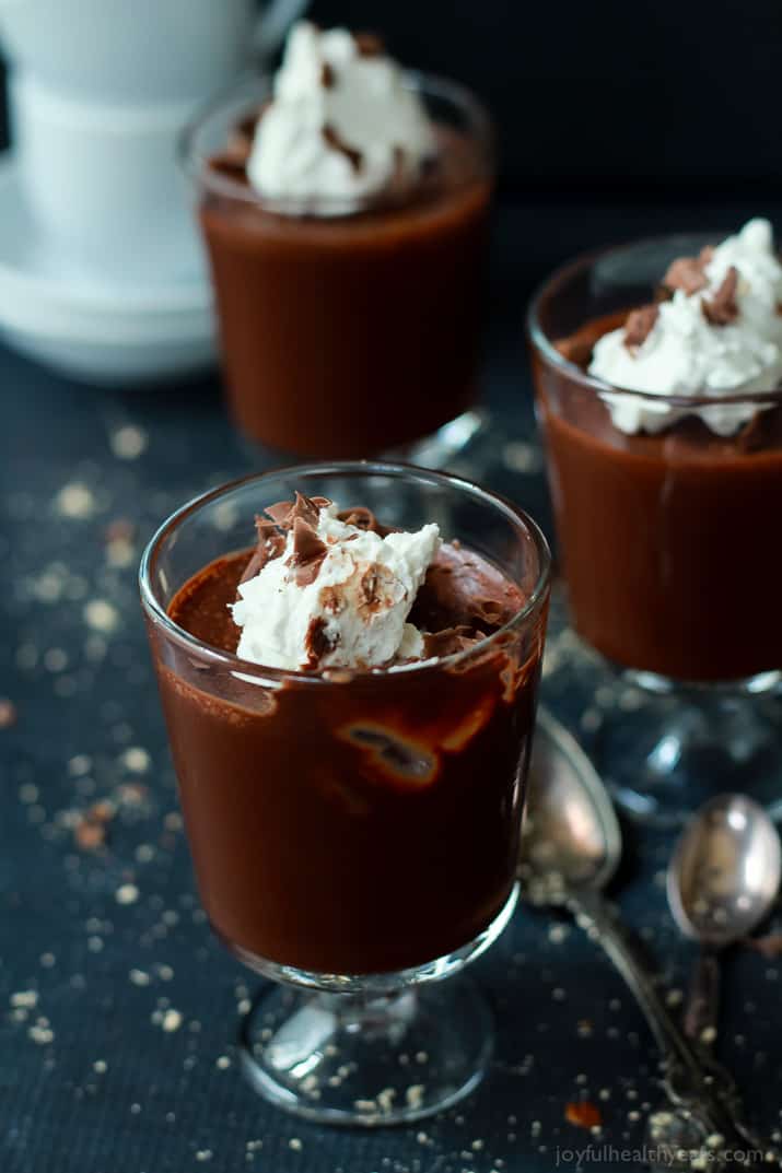 A Glass Filled with Chocolate Mousse and a Dollop of Coconut Whipped Cream
