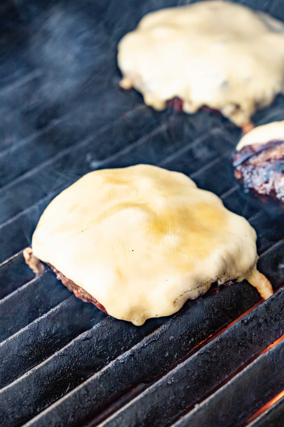 Melted gouda on the patties. 