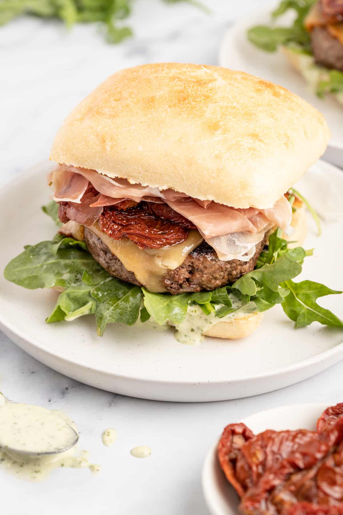 Italian cheeseburger on a plate. 