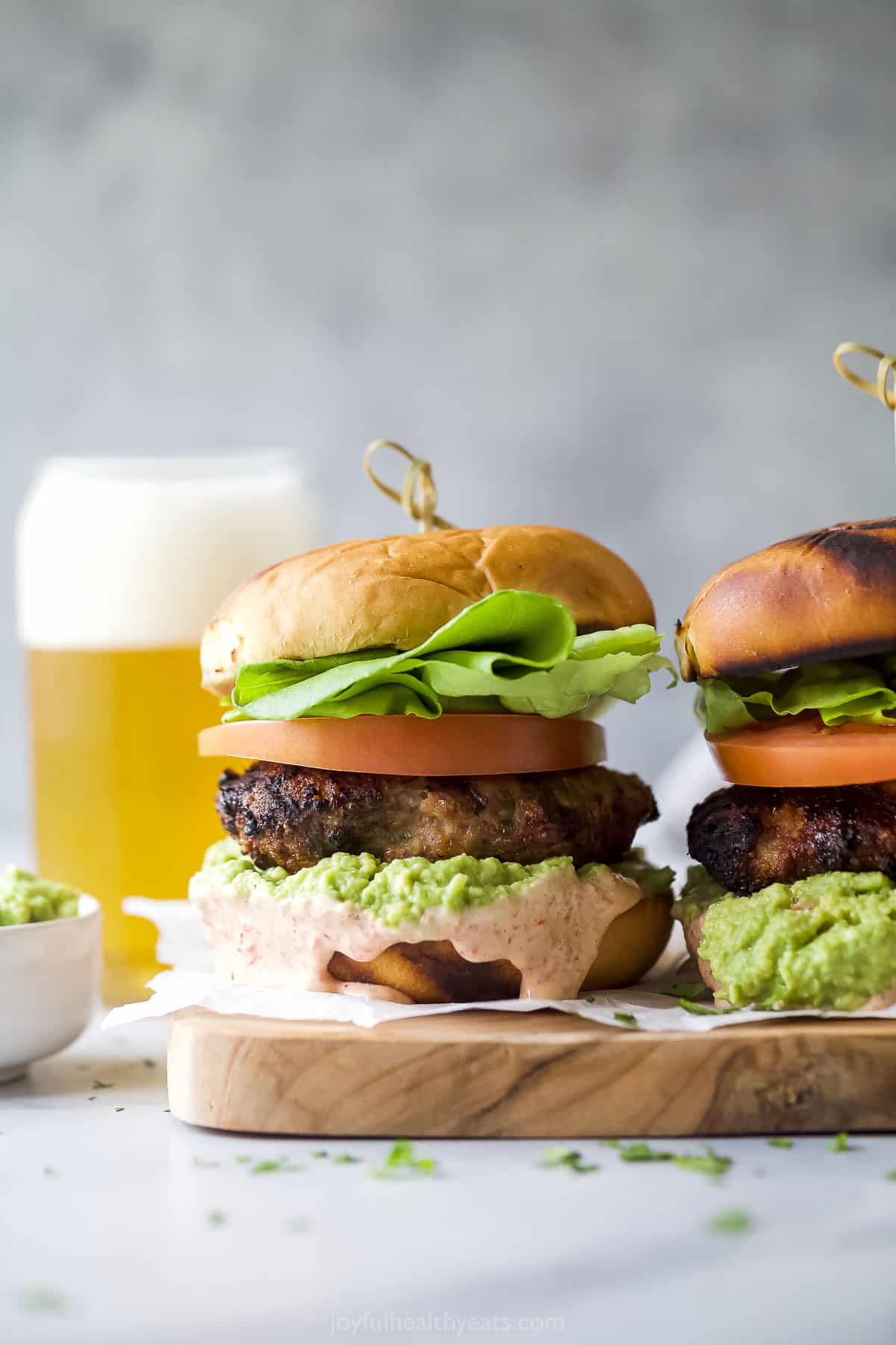 This 20-minute turkey burger with piquillo mayo and guacamole will be your new favorite summer recipe. It's perfect for cookouts! One grilled turkey burger.