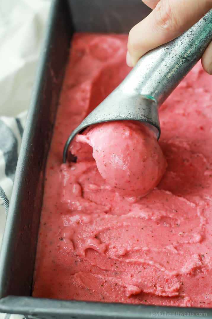 A 5-Minute Healthy Strawberry Basil Frozen Yogurt recipe perfect to cool you down in summer, made with only 5 ingredients and naturally sweetened! | joyfulhealthyeats.com #recipes