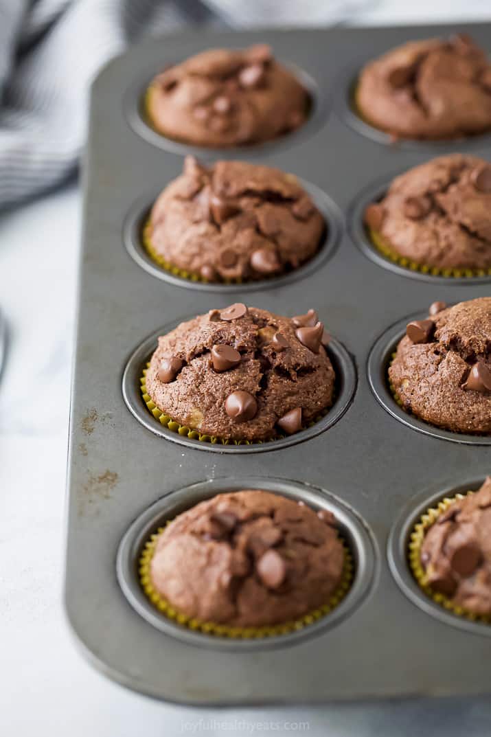 a photo of the best skinny double chocolate banana muffins in a muffin tin