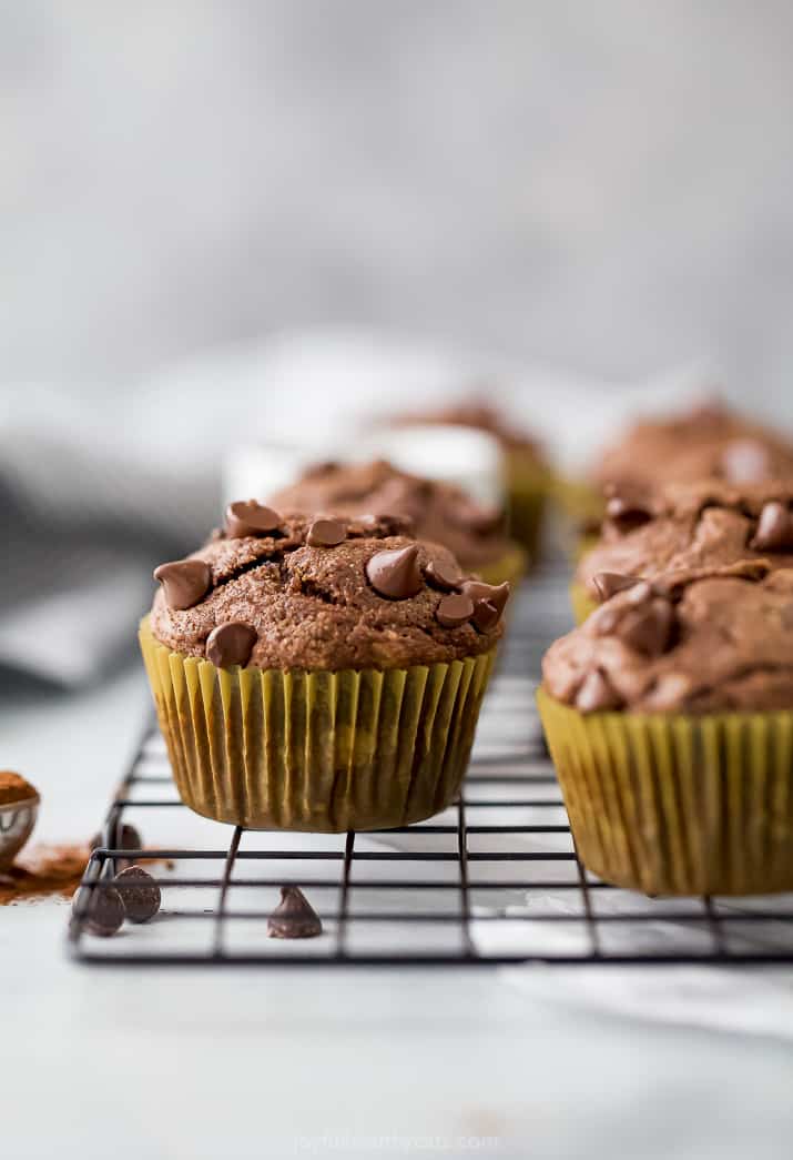 a photo of the best skinny double chocolate banana muffins cooling on a rack