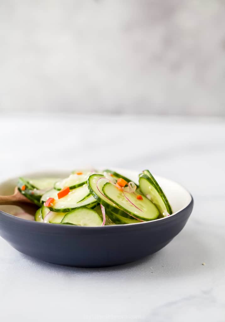 side photo of 10 Minute Easy Asian Cucumber Salad Recipe (Dairy Free) in a bowl