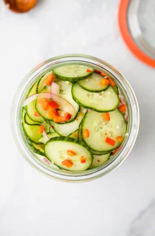 10 Minute Easy Asian Cucumber Salad Recipe (Dairy Free) in a big glass jar