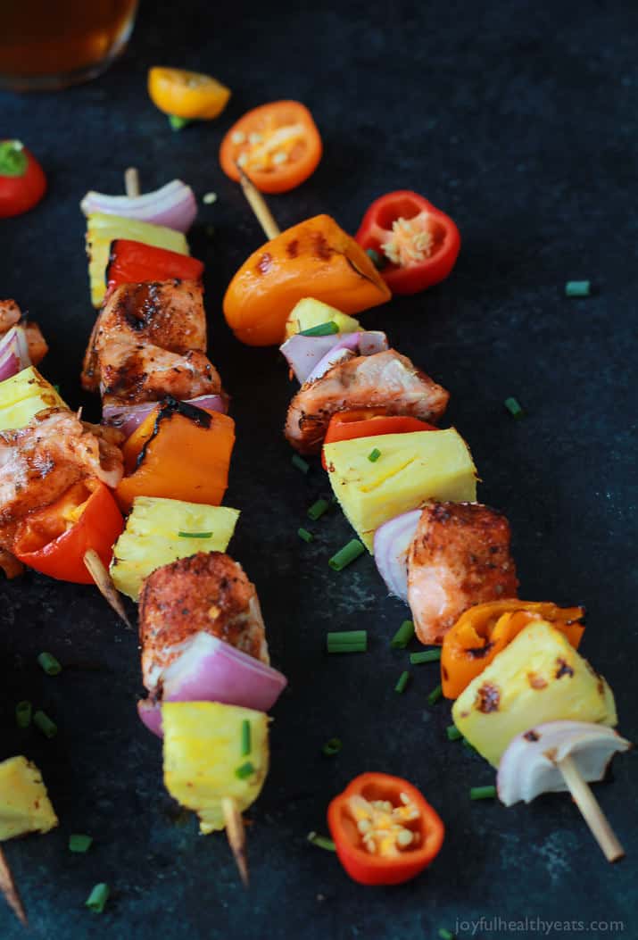 Caribbean Grilled Salmon Kabobs with cajun spices, fresh pineapple, bell peppers, and fresh seafood