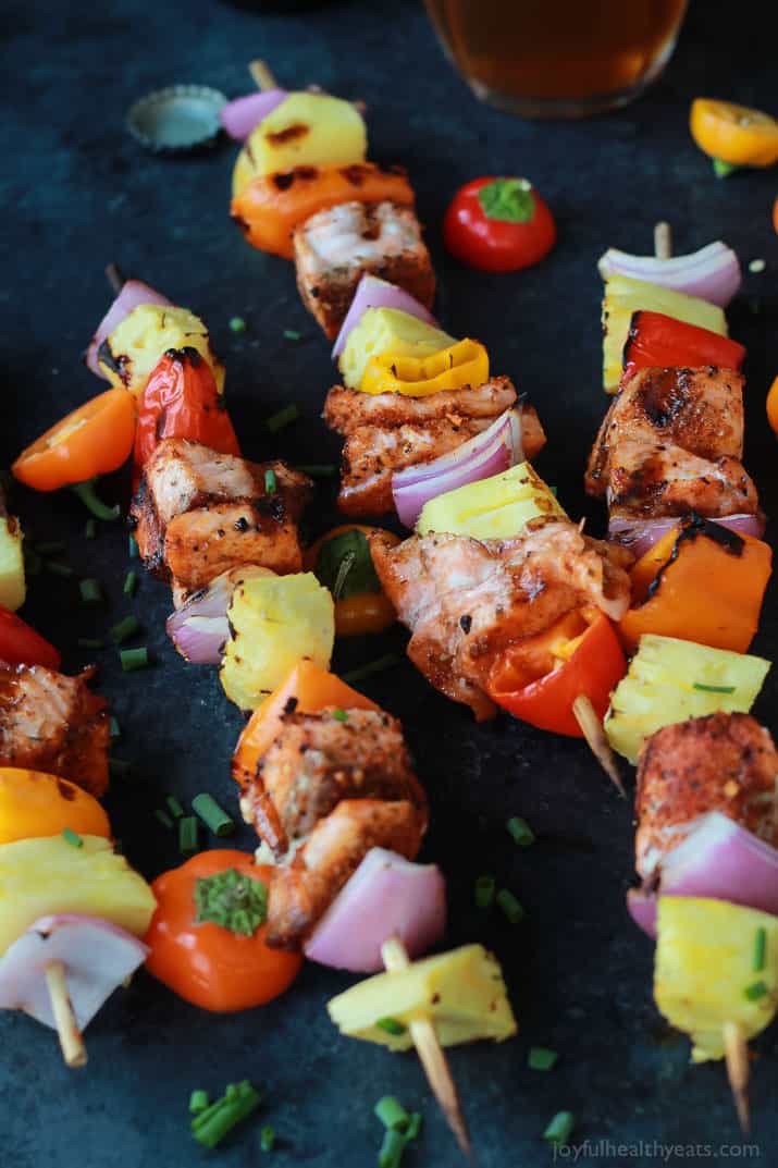Caribbean Grilled Salmon Kabobs with cajun spices, fresh pineapple, bell peppers, and fresh seafood
