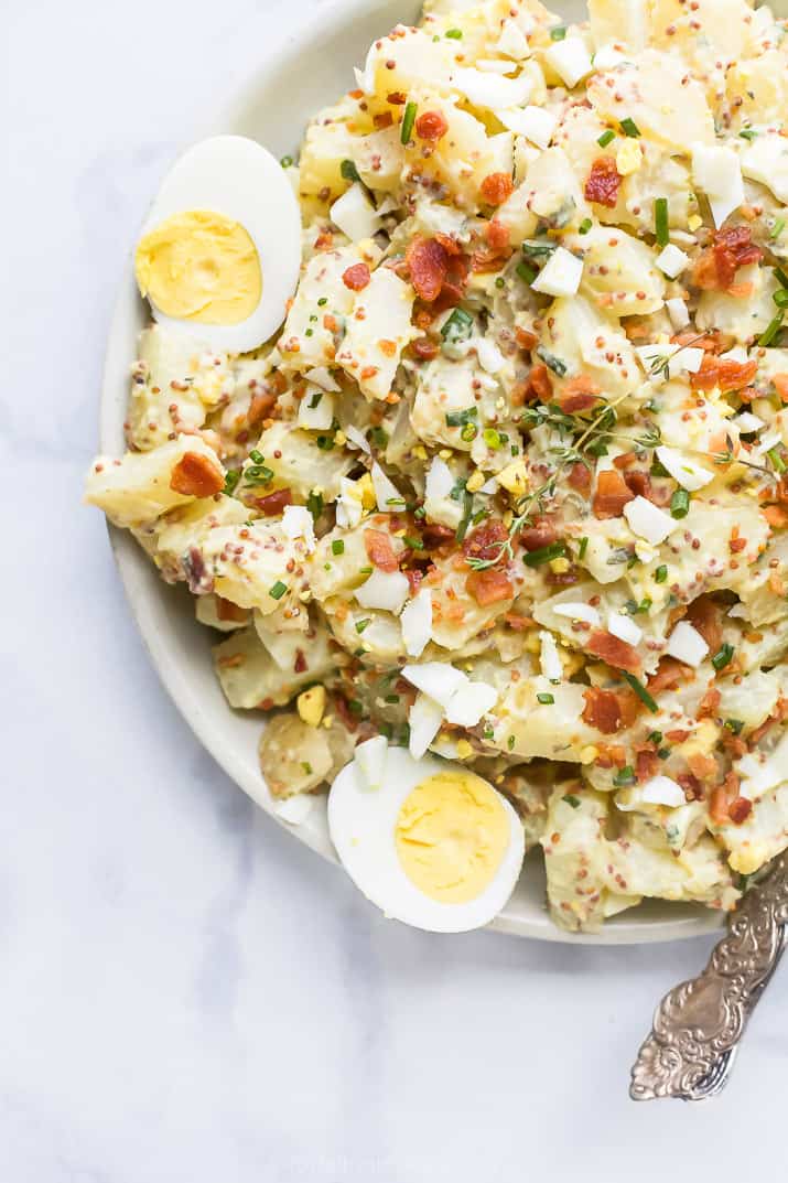 creamy easy potato salad recipe with bacon on a plate