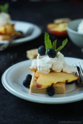 This Grilled Peach Shortcake is a fun twist on a classic strawberry shortcake recipe. Filled with buttery shortbread, grilled peaches, and coconut whipped cream - a sure winner this summer! | joyfulhealthyeats.com #recipes #summer #ad Easy Healthy Recipes