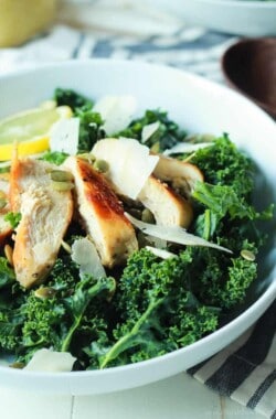 Easy Kale Chicken Caesar Salad with pepitas, shaved parmesan and a homemade egg and anchovy free Caesar Dressing! Its the perfect salad recipe to have for the summer! | joyfulhealthyeats.com Easy Healthy Recipes
