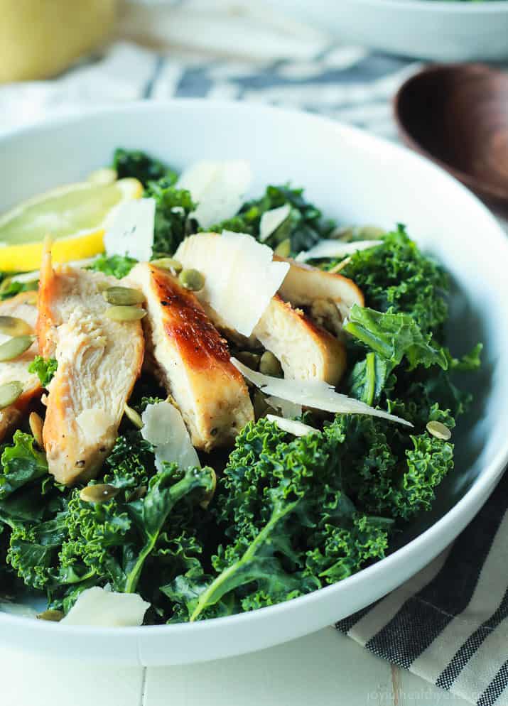 Easy Kale Chicken Caesar Salad with pepitas, shaved parmesan and a homemade egg and anchovy free Caesar Dressing! Its the perfect salad recipe to have for the summer! | joyfulhealthyeats.com Easy Healthy Recipes