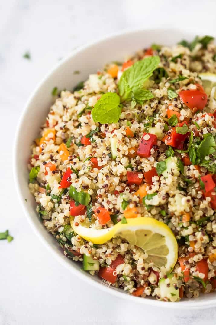 close up photo of 20 minute quinoa tabbouleh salad in a bowl