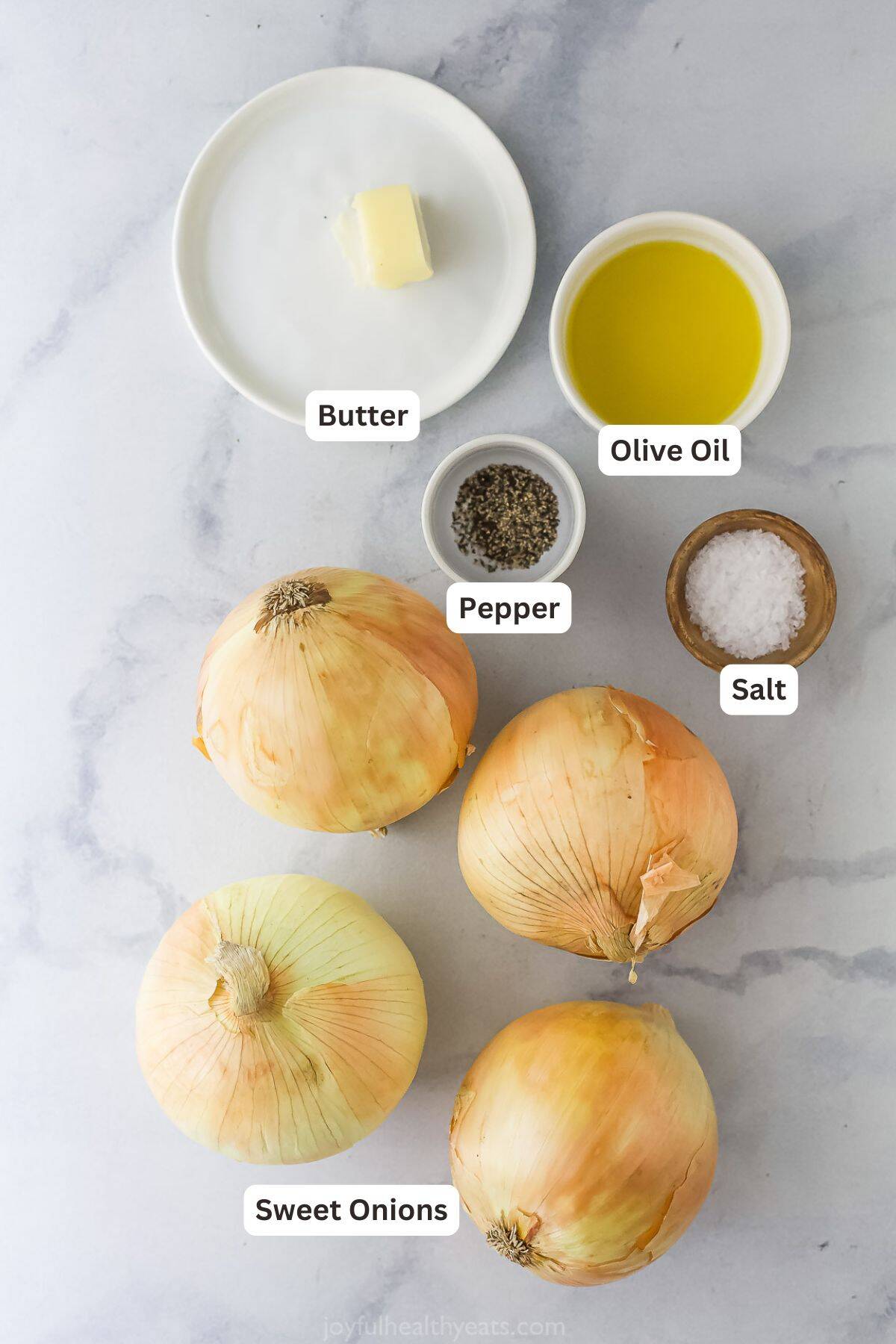 Overhead view of ingredients for caramelized onions.
