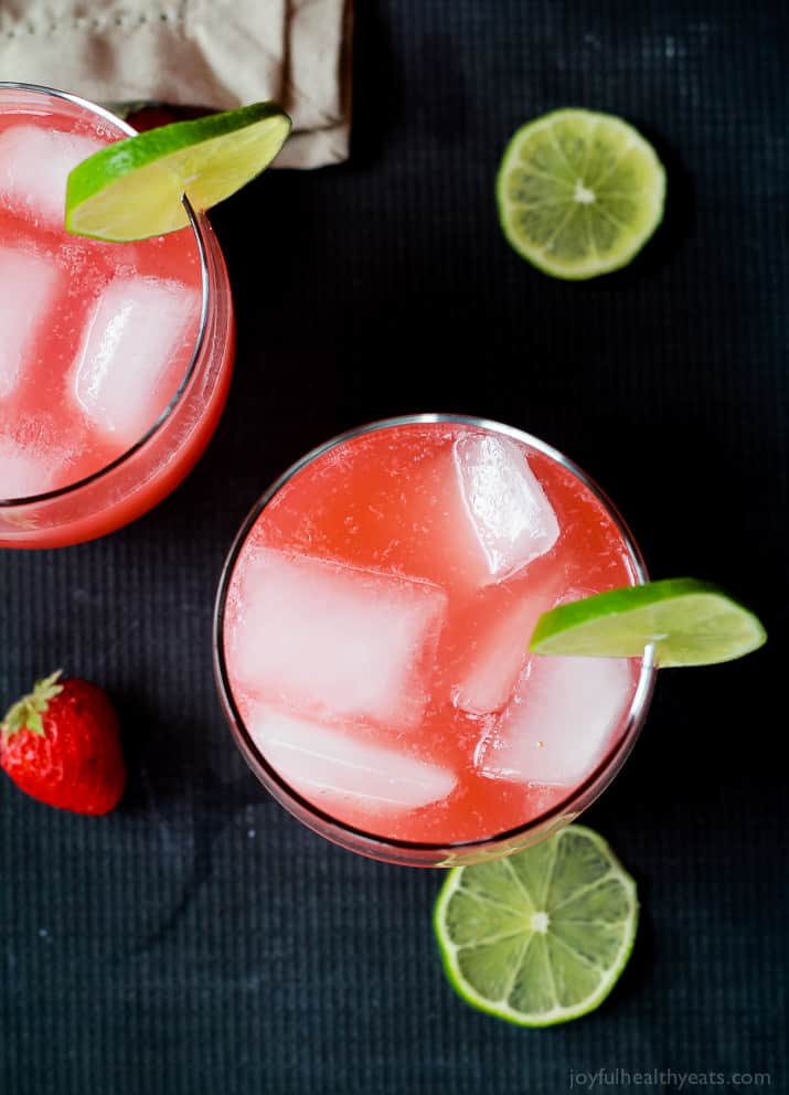 Top view of two glasses of Fresh Strawberry Limeade