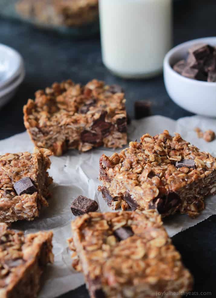 Breakfast never tasted so good with these No Bake Peanut Butter Chocolate Bars, done in 5 minutes! Filled with chocolate chunks, creamy peanut butter, chia seeds, and loads of other nutrients to fill you up! | joyfulhealthyeats.com #recipes