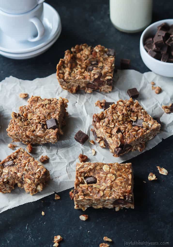 Breakfast never tasted so good with these No Bake Peanut Butter Chocolate Bars, done in 5 minutes! Filled with chocolate chunks, creamy peanut butter, chia seeds, and loads of other nutrients to fill you up! | joyfulhealthyeats.com #recipes Easy Healthy Recipes