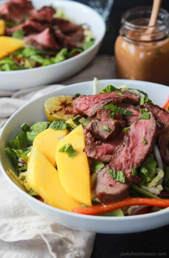 Thai Steak Salad is filled with loads of vegetables, grilled steak, and then topped with a Spicy Peanut Dressing, all in 20 minutes and only 376 calories! I call that a win! | joyfulhealthyeats.com #recipes #30minutemeal Easy Dinner Recipes