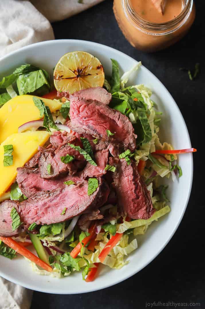 Thai Steak Salad is filled with loads of vegetables, grilled steak, and then topped with a Spicy Peanut Dressing, all in 20 minutes and only 376 calories! I call that a win! | joyfulhealthyeats.com #recipes #30minutemeal