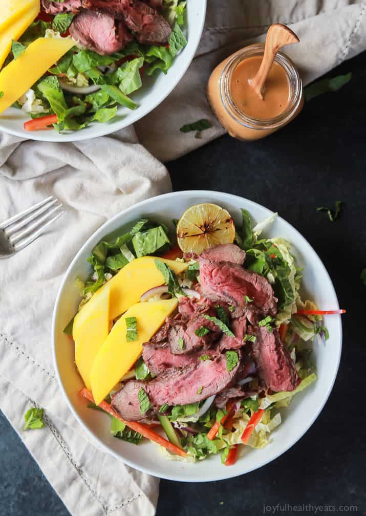 Thai Steak Salad is filled with loads of vegetables, grilled steak, and then topped with a Spicy Peanut Dressing, all in 20 minutes and only 376 calories! I call that a win! | joyfulhealthyeats.com #recipes #30minutemeal