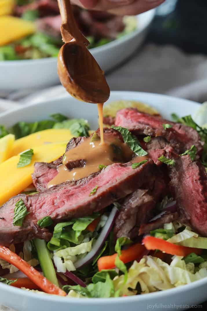 Thai Steak Salad is filled with loads of vegetables, grilled steak, and then topped with a Spicy Peanut Dressing, all in 20 minutes and only 376 calories! I call that a win! | joyfulhealthyeats.com #recipes #30minutemeal