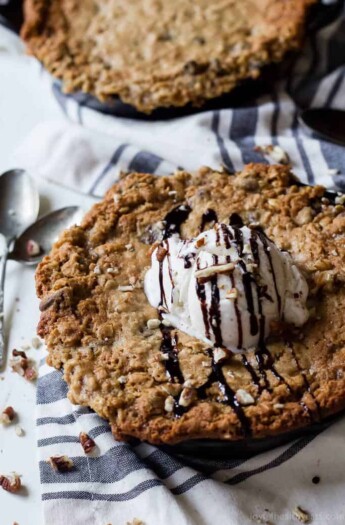 Chocolately, Gooey, and delicious Coconut Oatmeal Chocolate Chip Skillet Cookie made with a few secret ingredients to make this dish only 213 calories a serving! | joyfulhealthyeats.com Easy Healthy Recipes