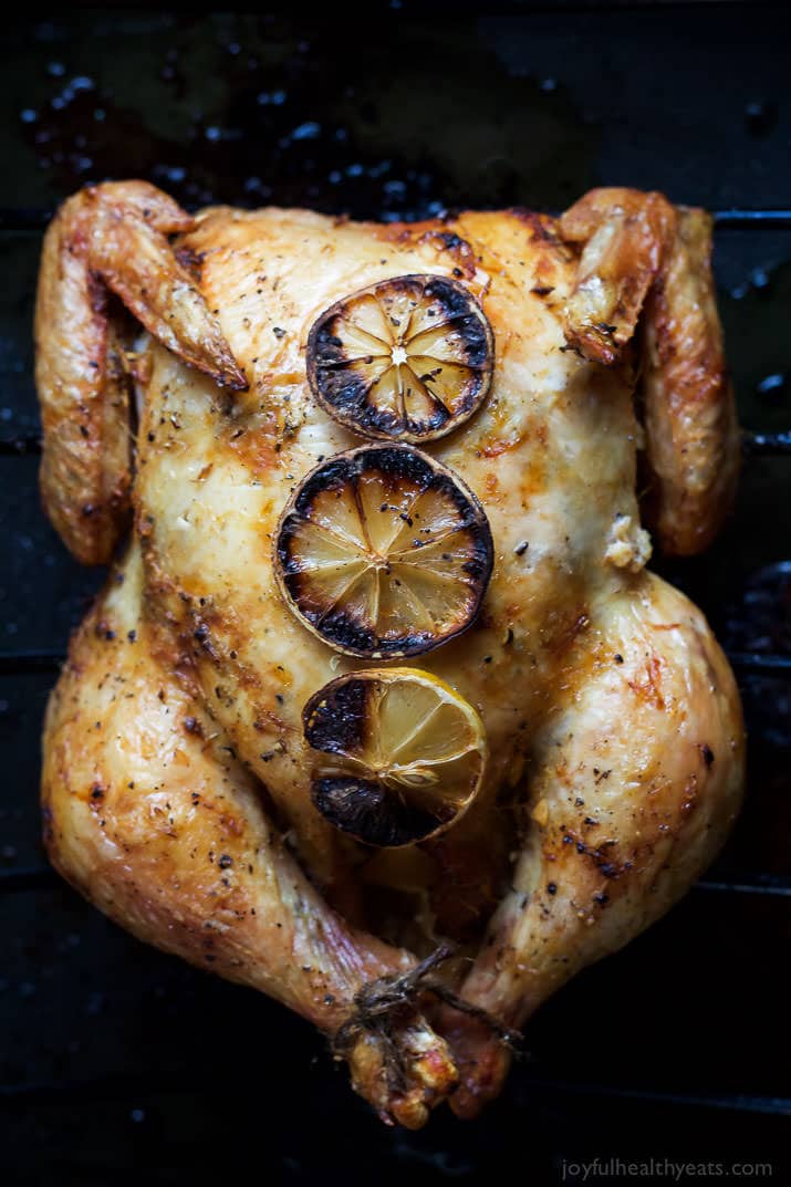 Forget the Rotisserie Chicken! You will fall in love with the crispy skin and smoky lemon garlic butter of this Oven Roasted Chicken Recipe, an easy, gluten free, paleo weeknight meal the family will love! | joyfulhealthyeats.com