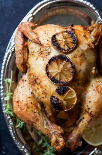 Forget the Rotisserie Chicken! You will fall in love with the crispy skin and smoky lemon garlic butter of this Oven Roasted Chicken Recipe, an easy, gluten free, paleo weeknight meal the family will love! | joyfulhealthyeats.com Easy Healthy Recipes