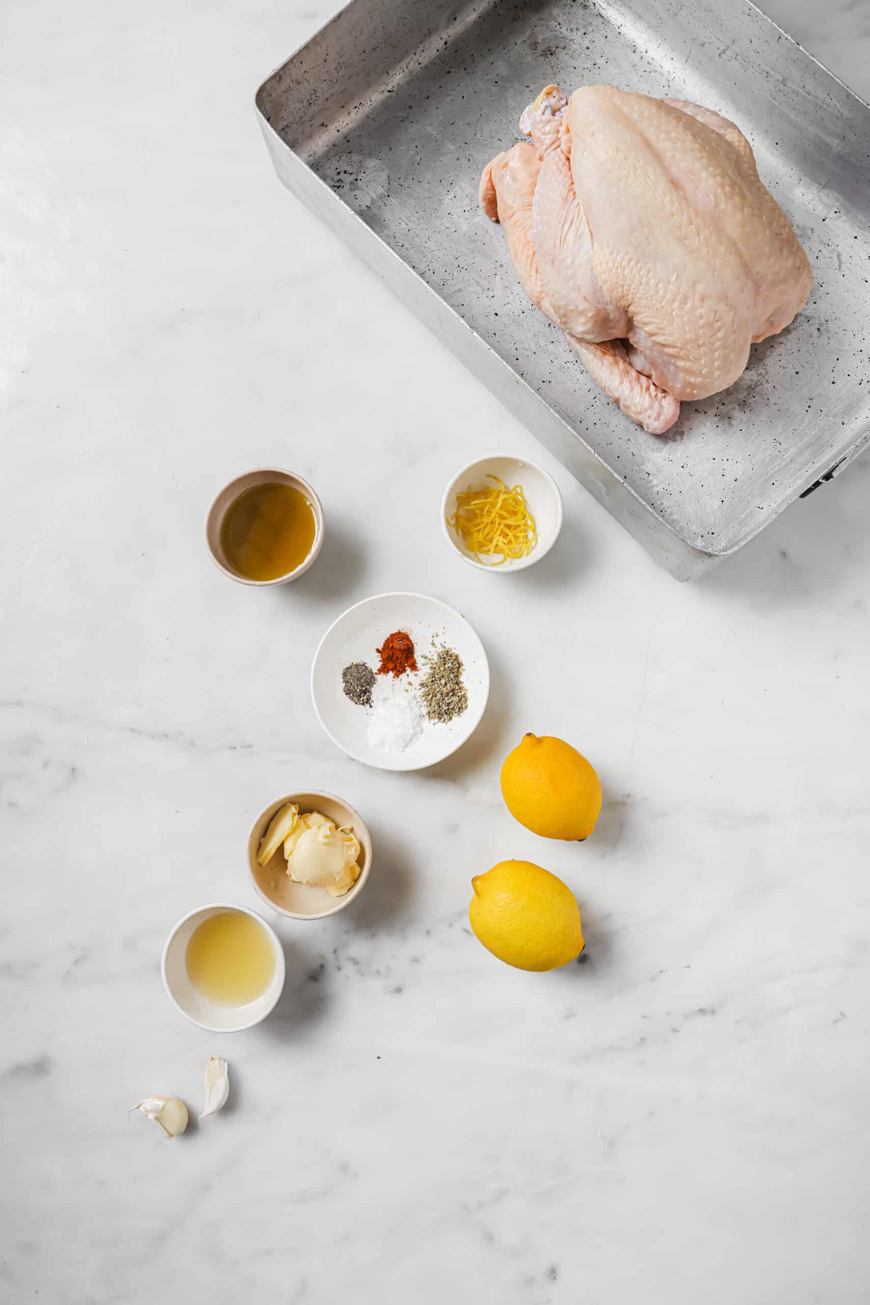 With crispy skin and zesty butter, this bake-and-forget roasted chicken recipe will be a weeknight favorite! Ingredients for roasted chicken recipe.