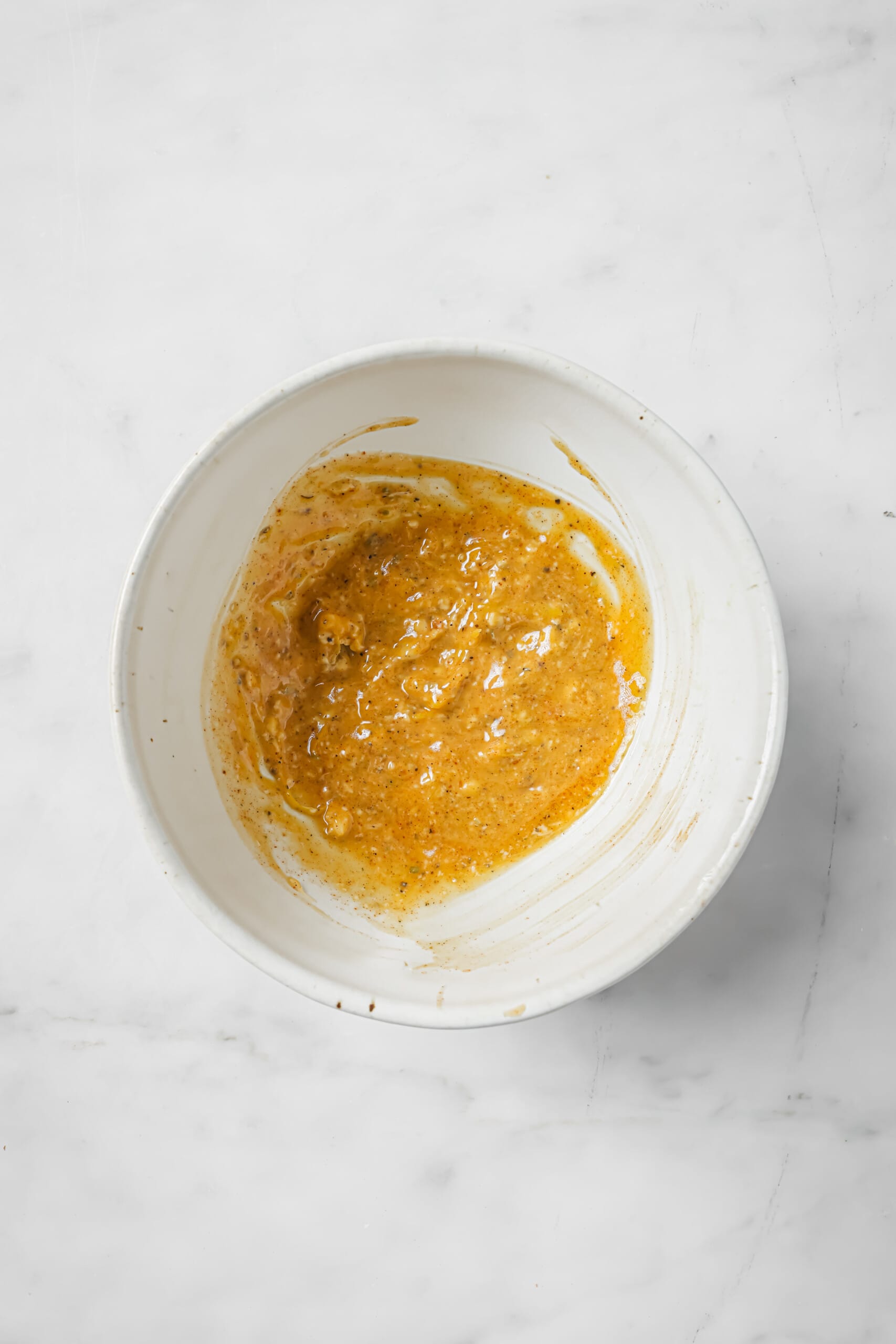 With crispy skin and zesty butter, this bake-and-forget roasted chicken recipe will be a weeknight favorite! Making the flavored butter.