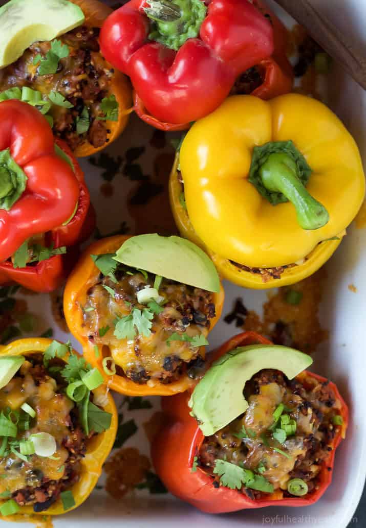 Southwestern Turkey Quinoa Stuffed Peppers filled with loads of protein and bold flavors that will leave you feeling satisfied and hungry for more all at the same time! Only 262 calories a serving! | joyfulhealthyeats.com #recipes