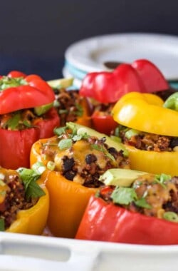 Southwestern Turkey Quinoa Stuffed Peppers filled with loads of protein and bold flavors that will leave you feeling satisfied and hungry for more all at the same time! Only 262 calories a serving! | joyfulhealthyeats.com #recipes