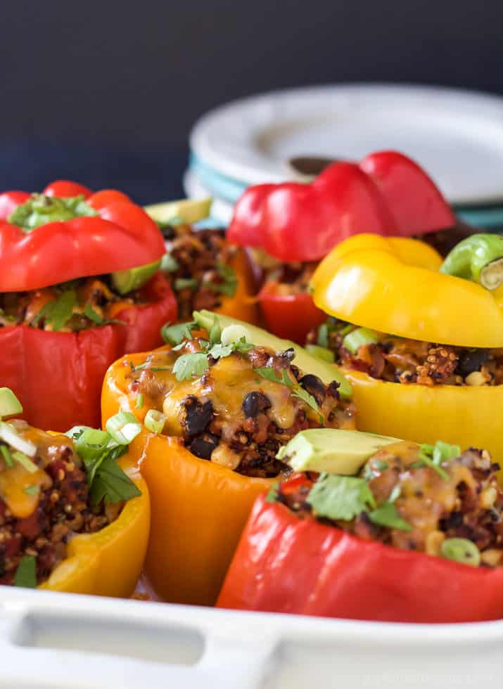 Southwestern Turkey Quinoa Stuffed Peppers filled with loads of protein and bold flavors that will leave you feeling satisfied and hungry for more all at the same time! Only 262 calories a serving! | joyfulhealthyeats.com #recipes