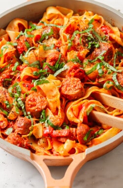 Close-up of pappardelle pasta in the skillet.