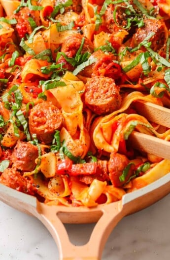 Close-up of pappardelle pasta in the skillet.