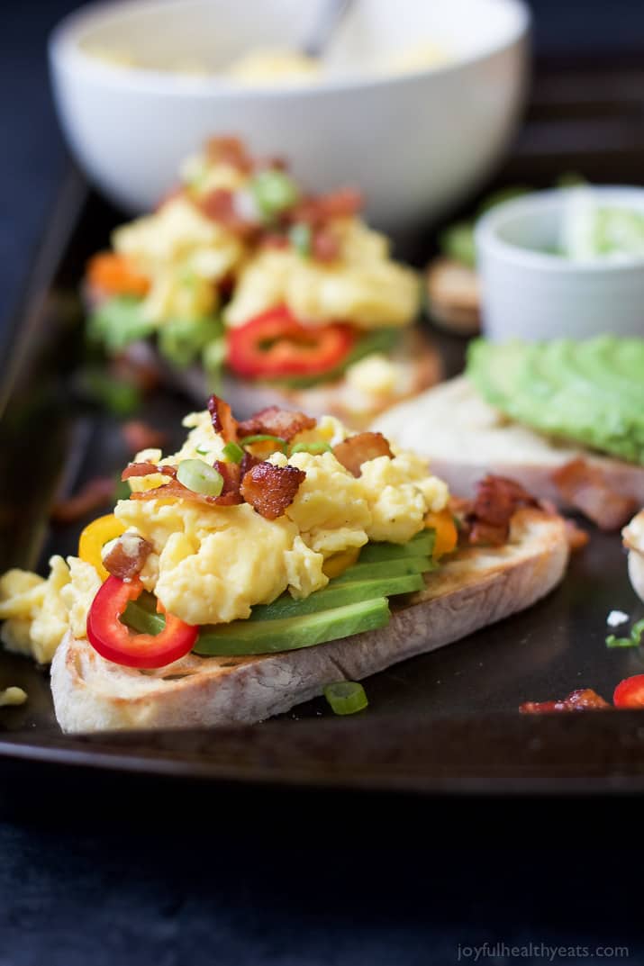 Two Servings of Breakfast Bruschetta Avocado Toast on a Baking Sheet