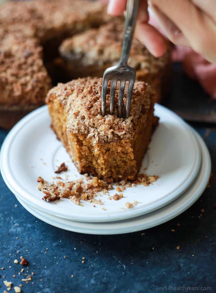 A family recipe that you need in your arsenal this fall! Pumpkin Spice Latte Coffee Cake, moist, loaded with pumpkin spice flavor with a touch of espresso for the best bite. Starbucks has nothing on this cake! | joyfulhealthyeats.com #recipe #fall