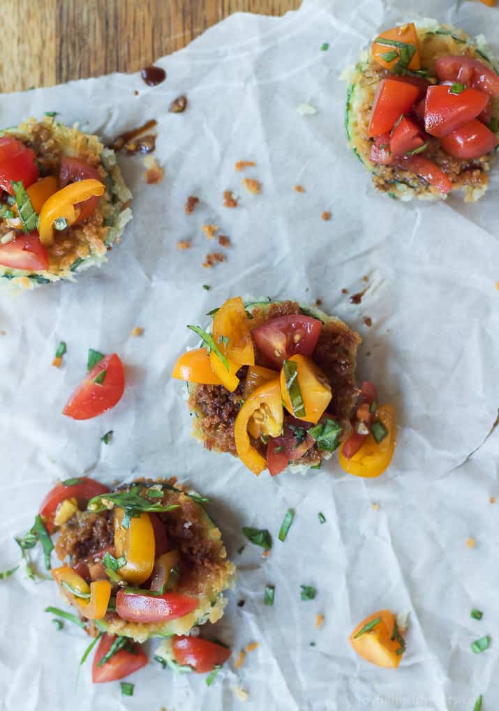 Skinny Bruschetta Zucchini Chips a low calorie, meat free, and dairy free, option for game day but still packs a punch of flavor from a few secret ingredients! This is a must try for sure! | joyfulhealthyeats.com #recipes #ad #MeatlessMondayNight