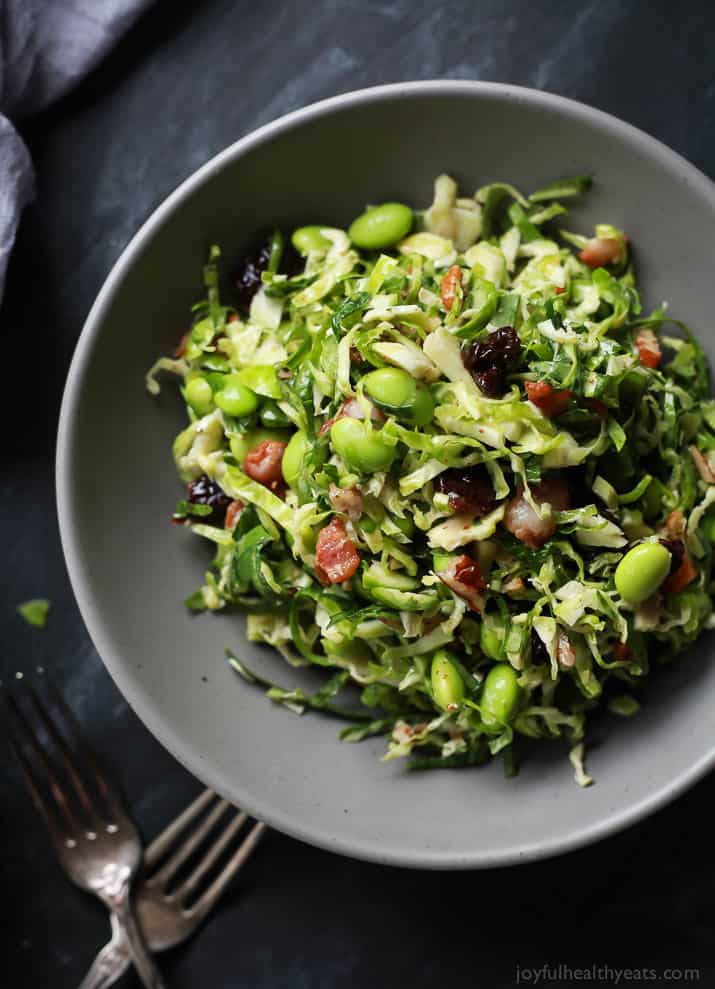 Top view of a bowl of Autumn Kale & Shaved Brussel Sprout Salad