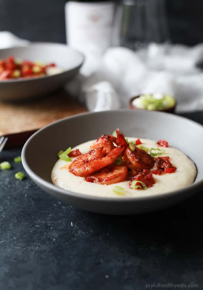 A bowl of Spicy Cajun Shrimp over creamy Smoked Gouda Grits